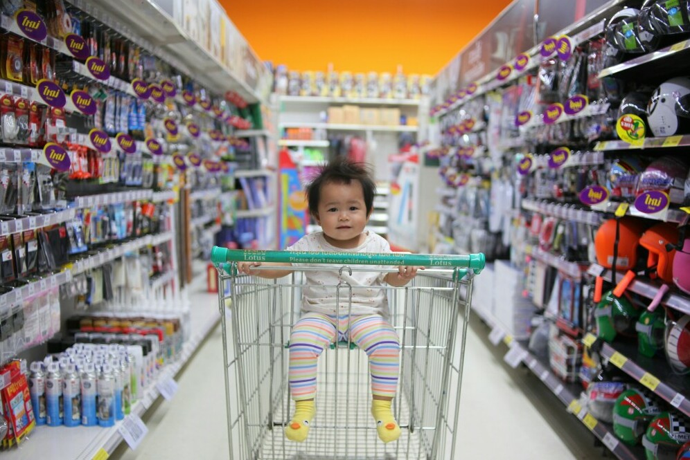 Baby in shopping trolly